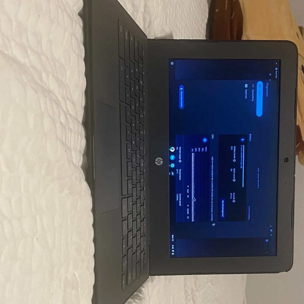 HP Black Laptop with Blue Screen Display